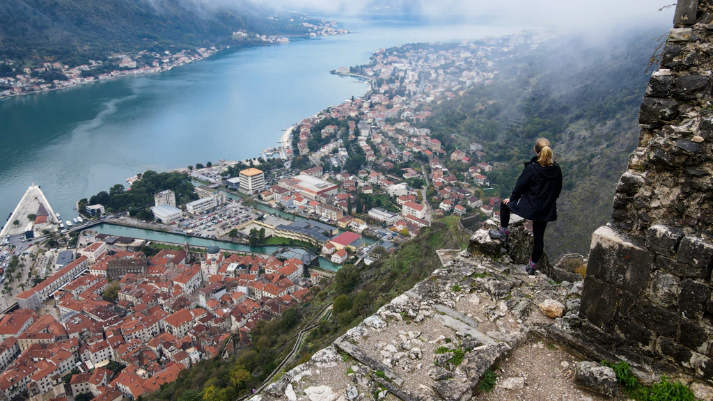Woman in Top of Old Town city in Kotor